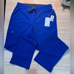 Koi Everyday Hero Pant. Color Galaxy. Size small. NWT.